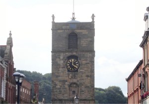 Old stone tower with two half life-size statues, Morpeth, Northumberland