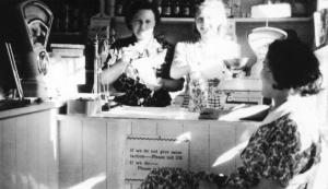 Nellie and Betty Manterfield serving in the shop (1954) Nellie and Betty Manterfield serving in the shop (1954)